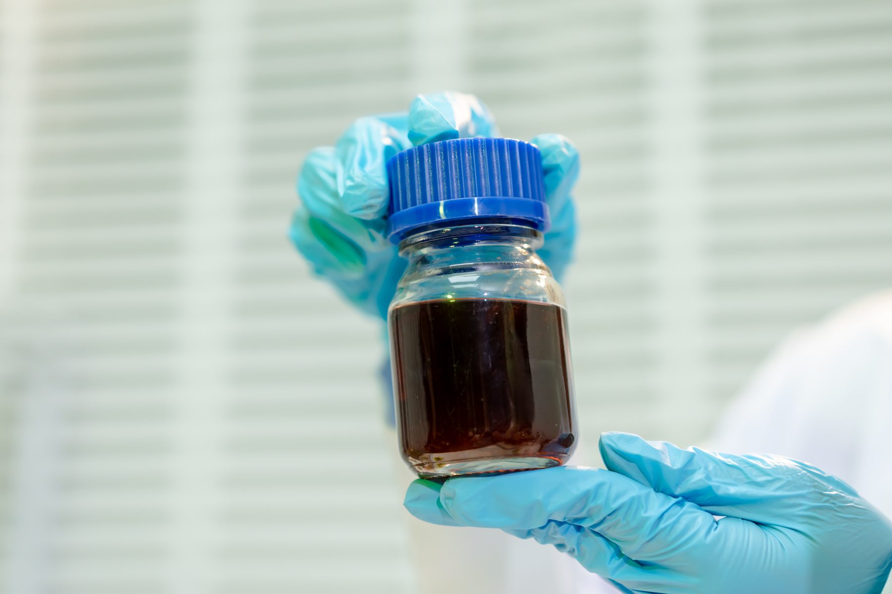 Laboratory oil sample taken from a standby generator for wear-metal analysis